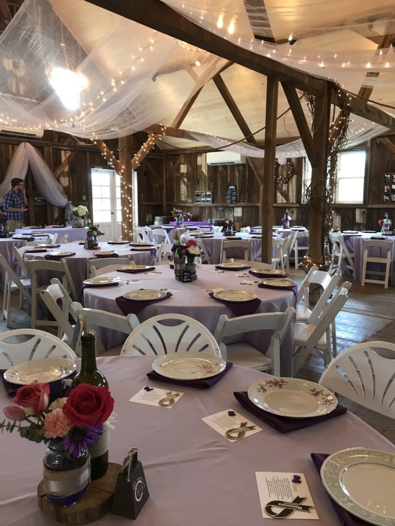 A large room with tables and chairs in it