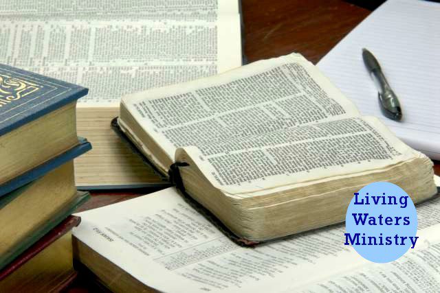 A table with some books and papers on it