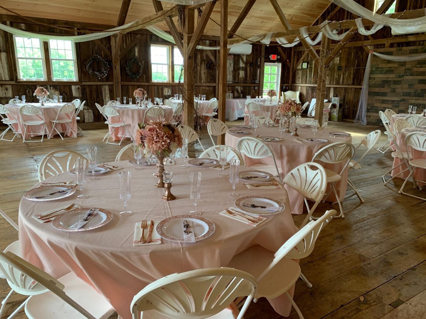 A large room with many tables and chairs